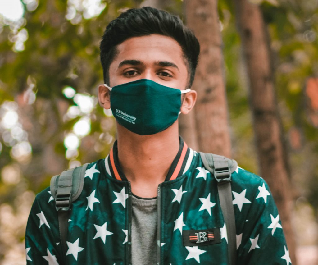 young man in a mask